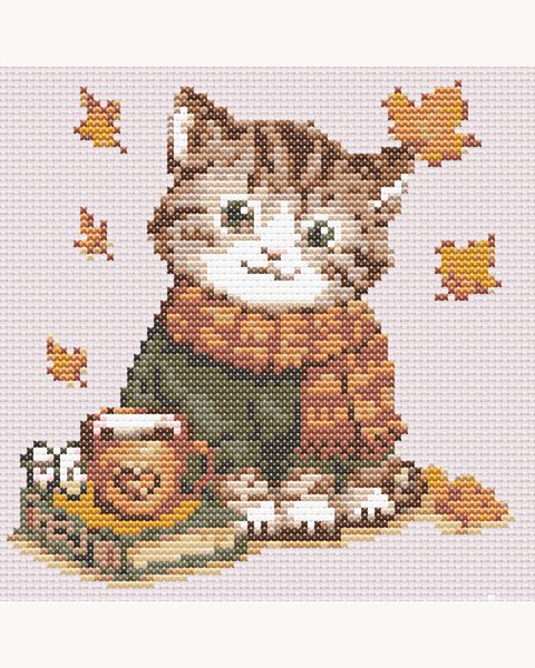 Cat September by Little Needle Crafts: a stitched tabby cat in a cosy sweater among autumn leaves.